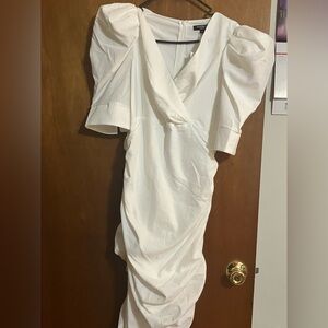 White puffy sleeve body con style dress
